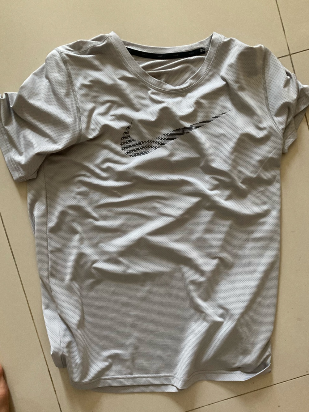 Nike Men’s White Short Sleeve Dri-FIT Tee with Black Swoosh